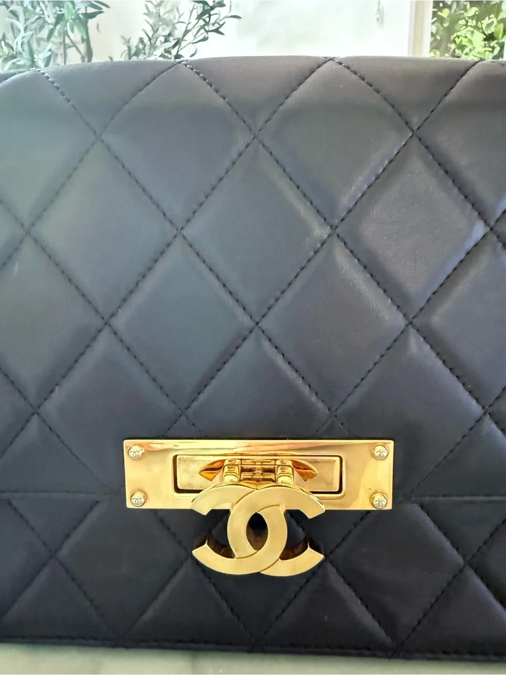 CHANEL Black Quilted Shoulder Bag with Gold Hardware